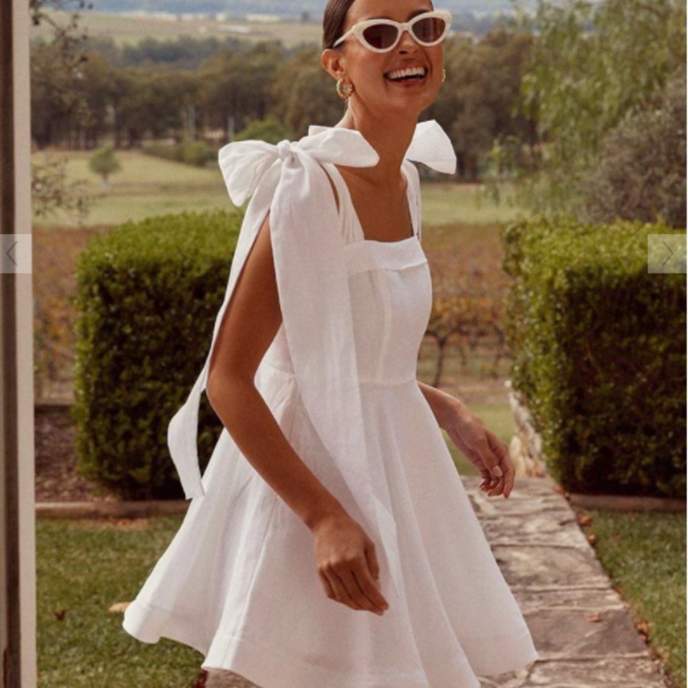 Dissh Aisle White Linen Bow Mini Dress (size US 8)